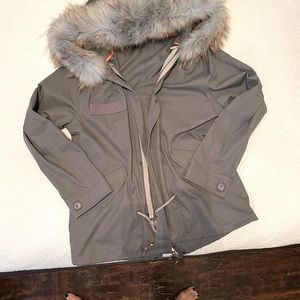 Grey parka with blue fur collar